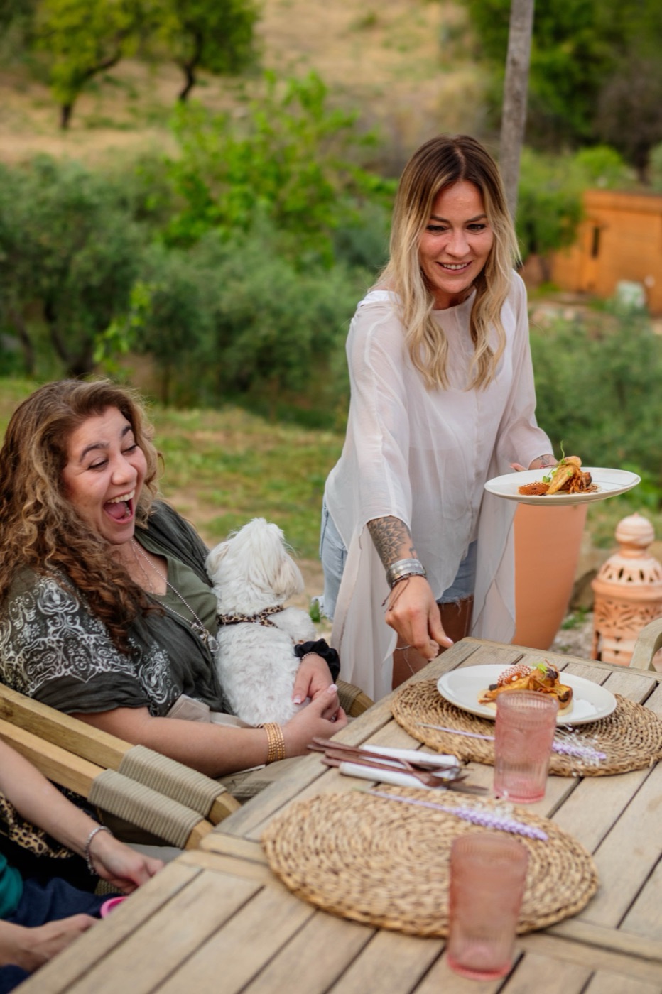A shared meal served at the outdoor table