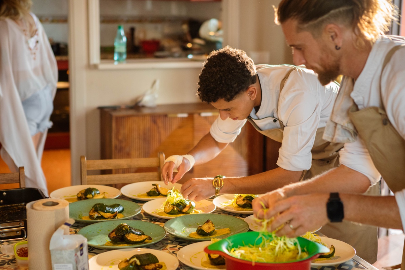 Chef plating a course in the kitchen