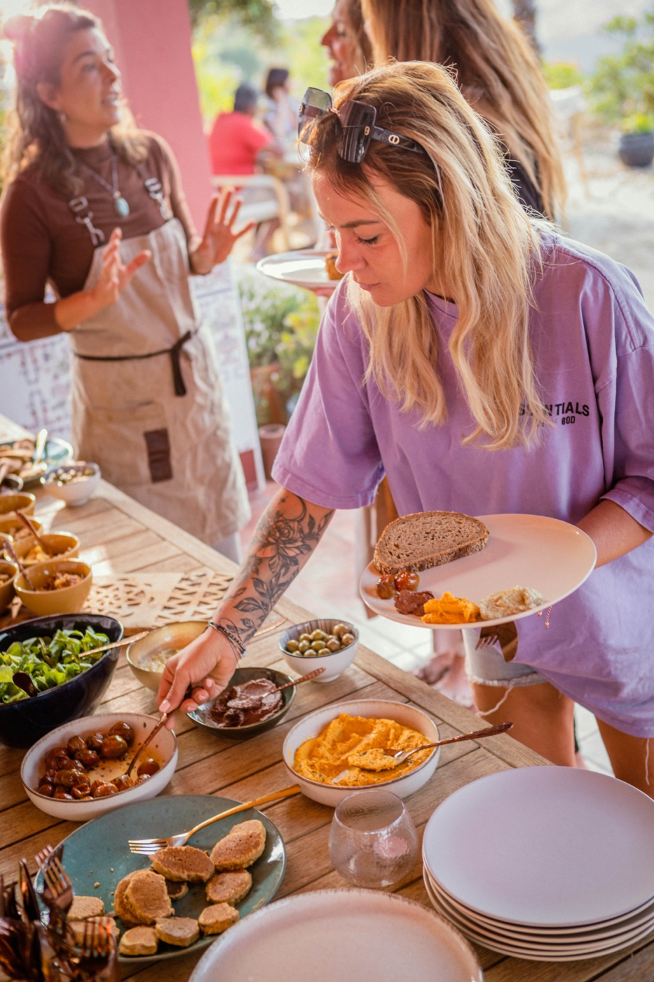 Sharing food at the long retreat table